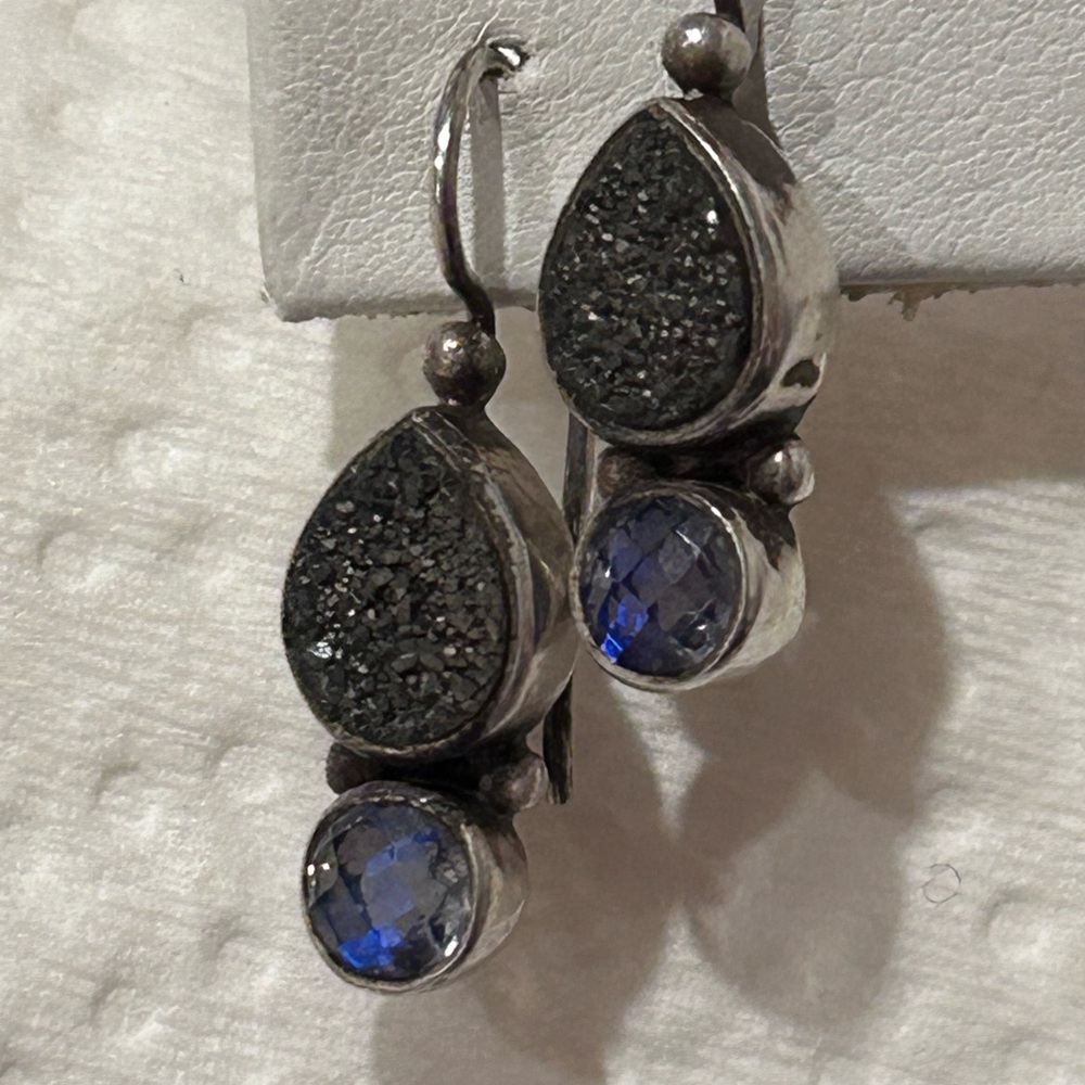 Moldevite and Sapphire earrings set in silver.